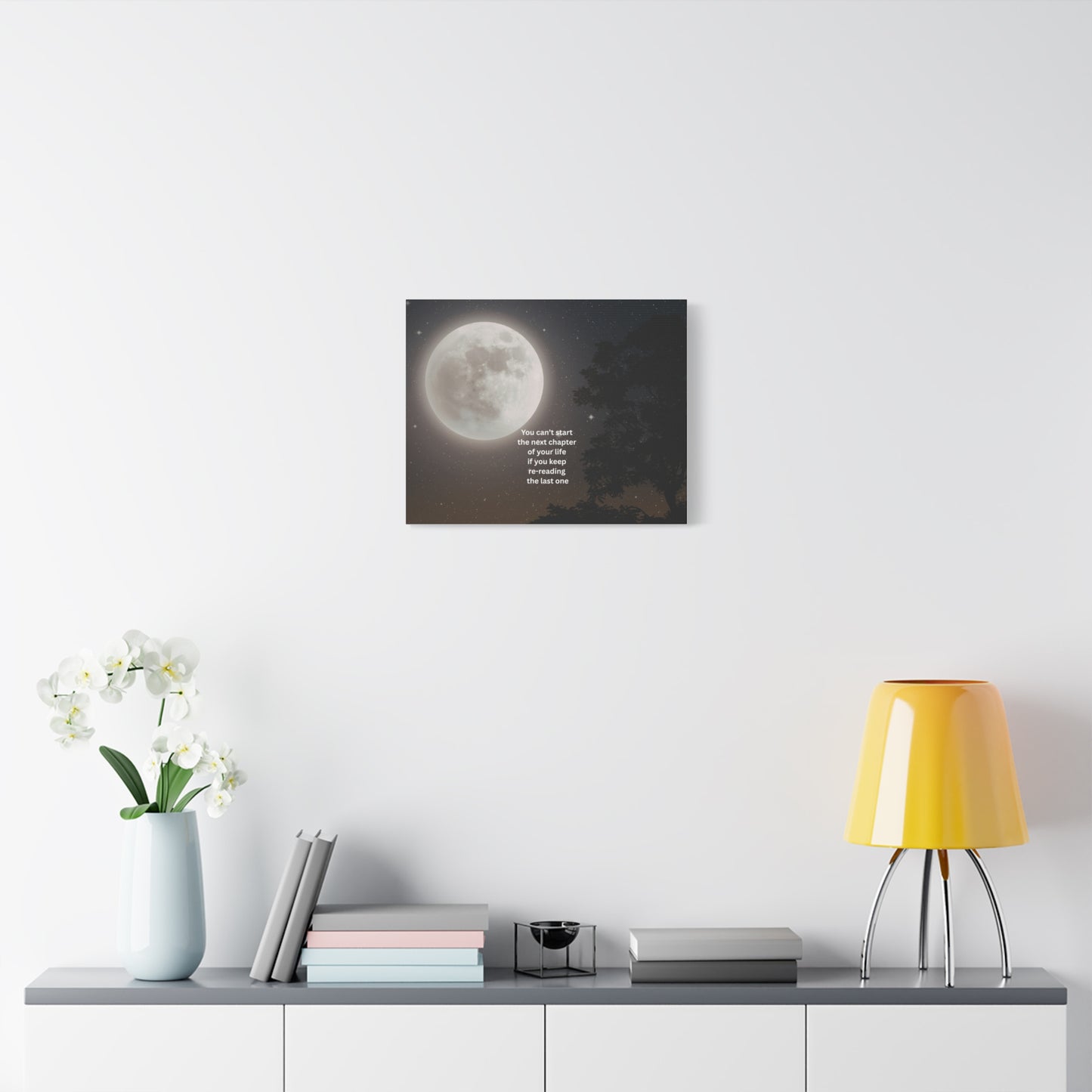 Inspirational Moon Canvas Print — "You can't start the next chapter of your life if you keep re-reading the last one"