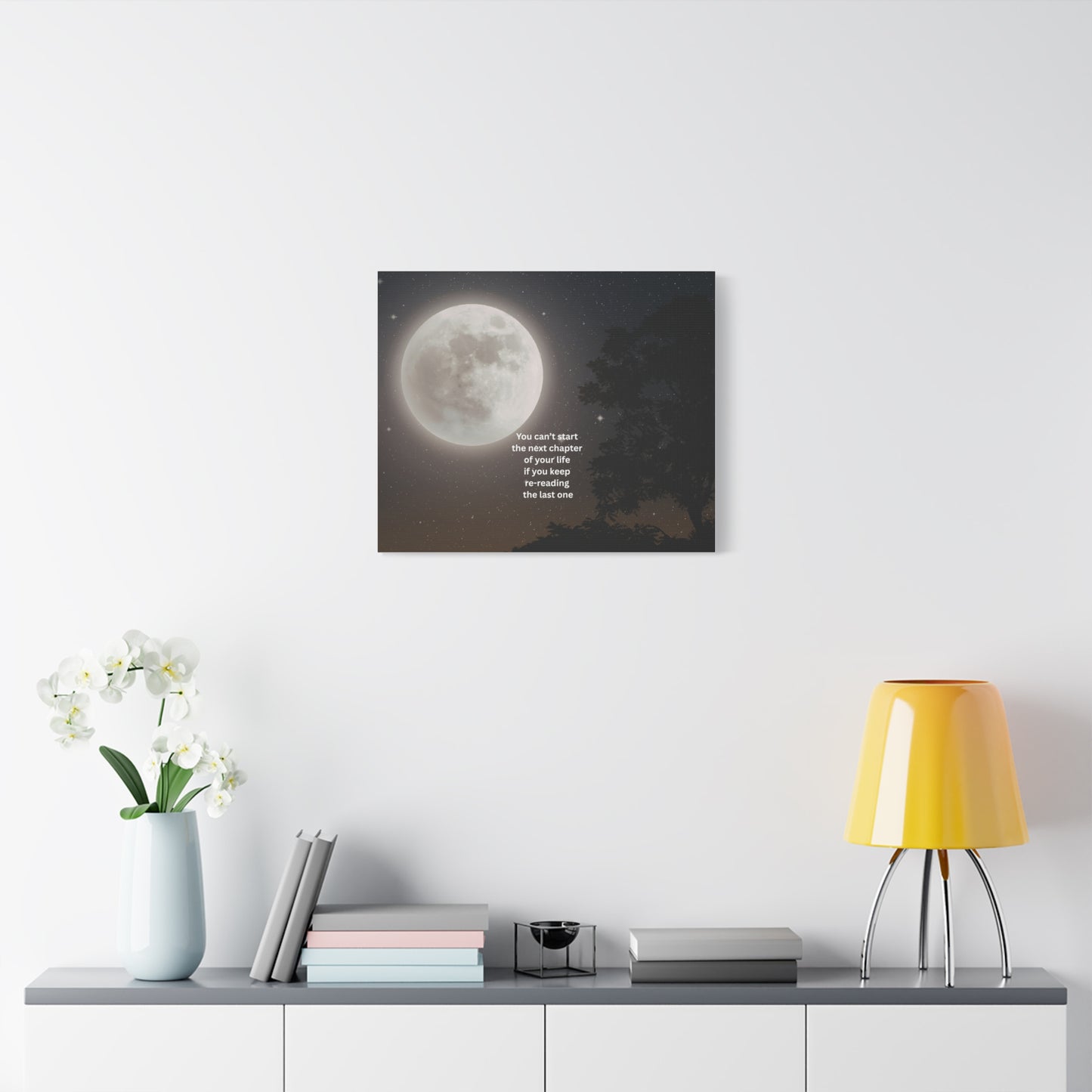 Inspirational Moon Canvas Print — "You can't start the next chapter of your life if you keep re-reading the last one"